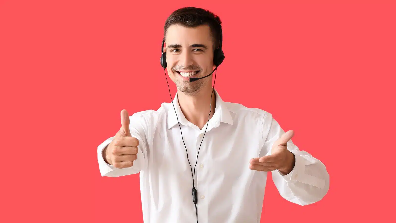 male call center worker with headset on a red background