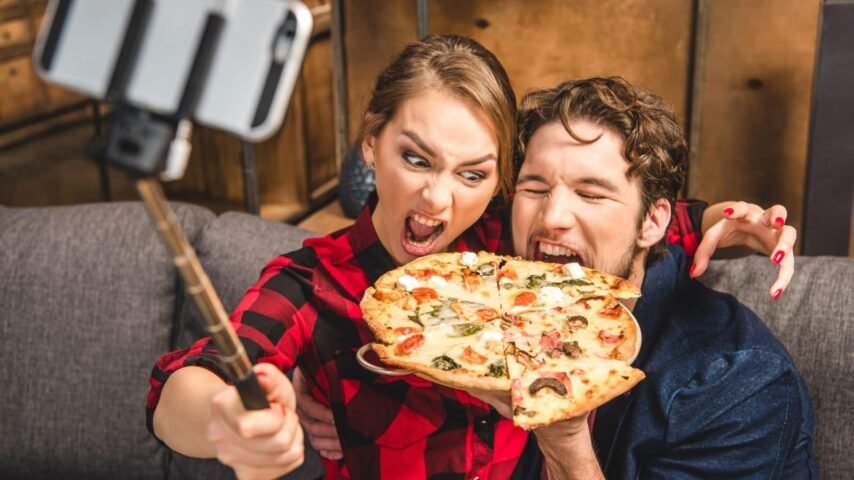 eating pizza selfie DmitryPoch