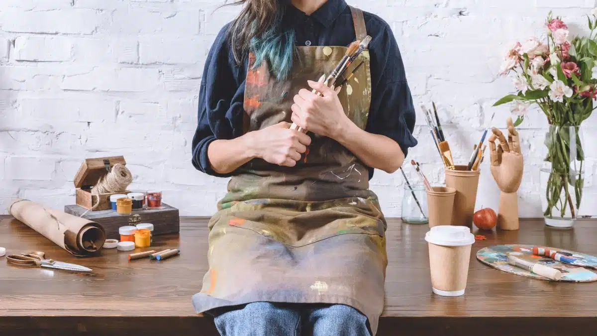 painter sitting on desk
