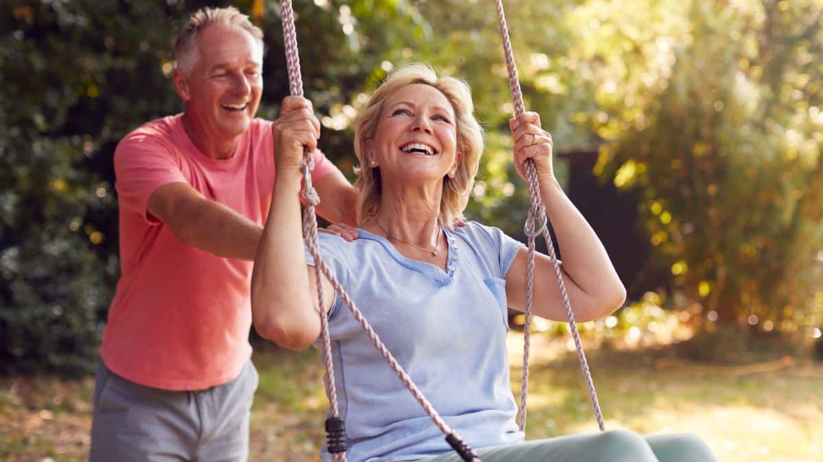 Couple enjoying their retirement in the swing MSN