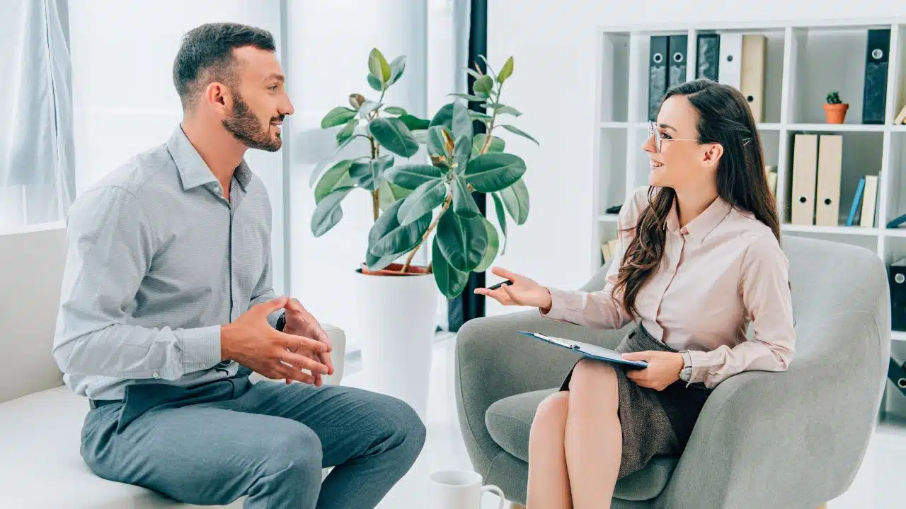 meeting between two professionals in an office