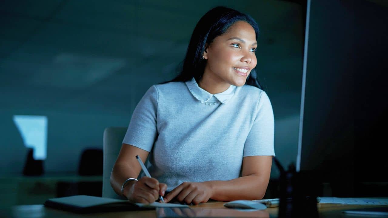 young woman working late in office