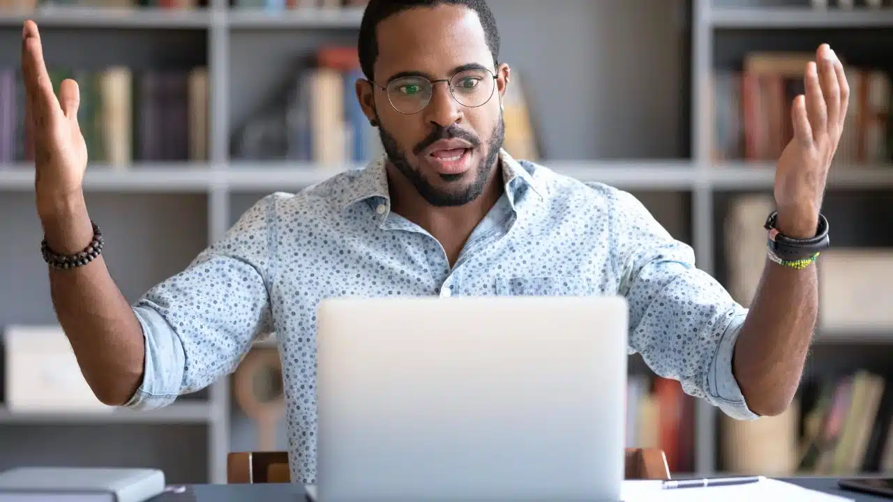 irritated man at computer