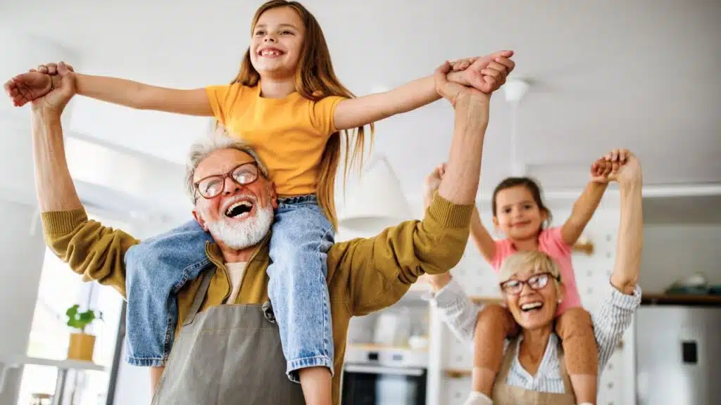 Happy grandparents having fun times with grandchildren