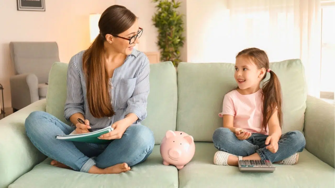 mother and daughter learning about money